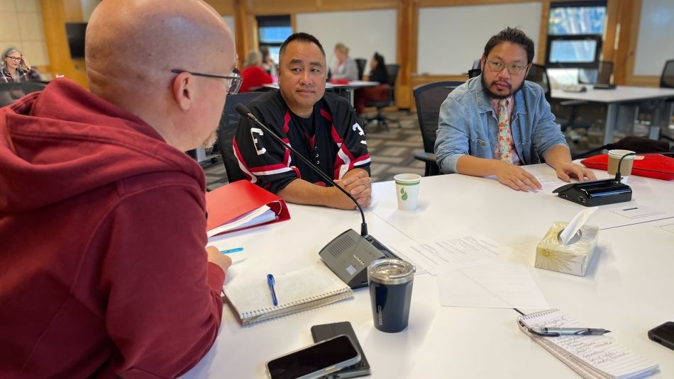 Delegates discussing during training module