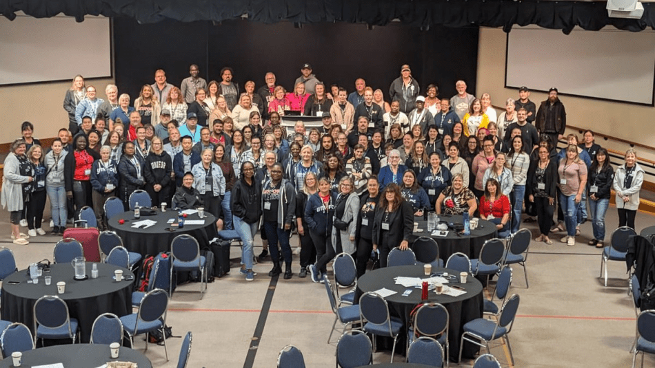 large gathering for of health care members for a group photo