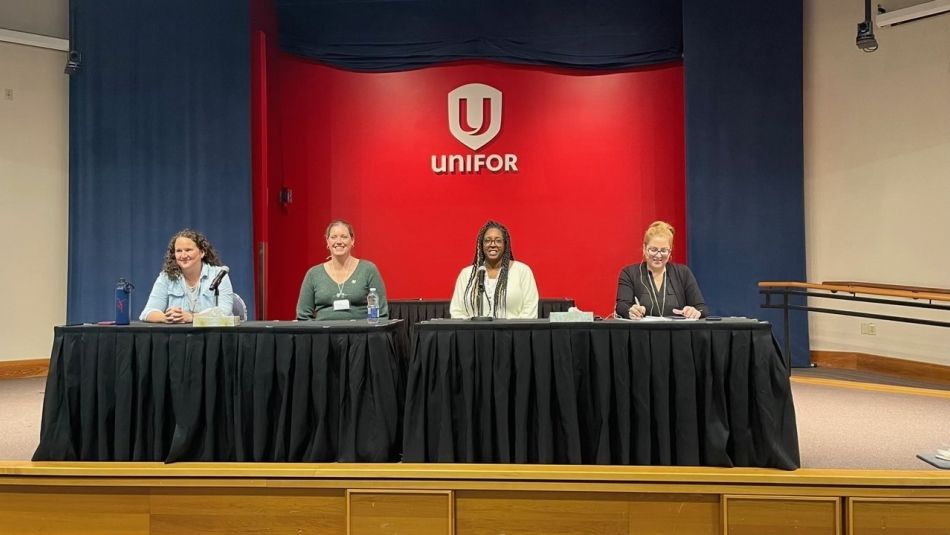 A pannel of four with a Unifor background.