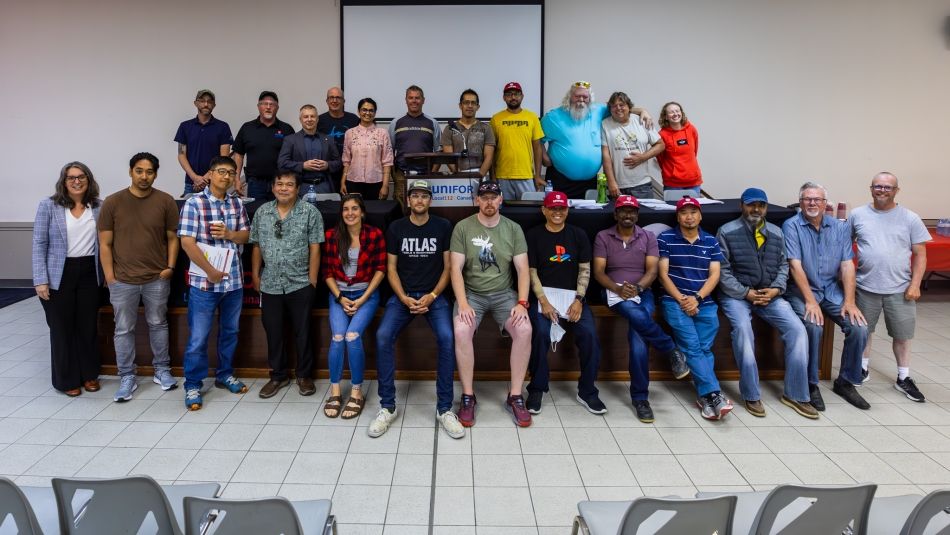 A group of people are posing for a picture