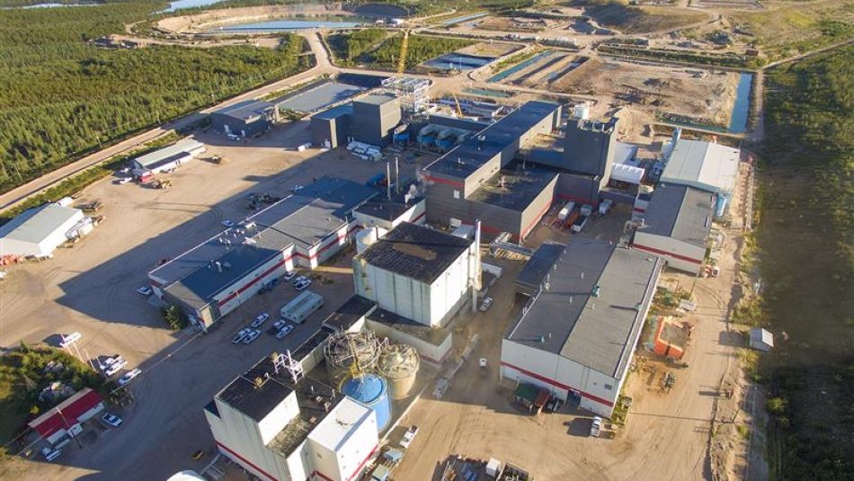 alt = Aerial view of an industrial site with many buildings and surrounded by forests and lakes. MR-20250814-Orano-L48-S-McClean-Lake-Mill.jpg