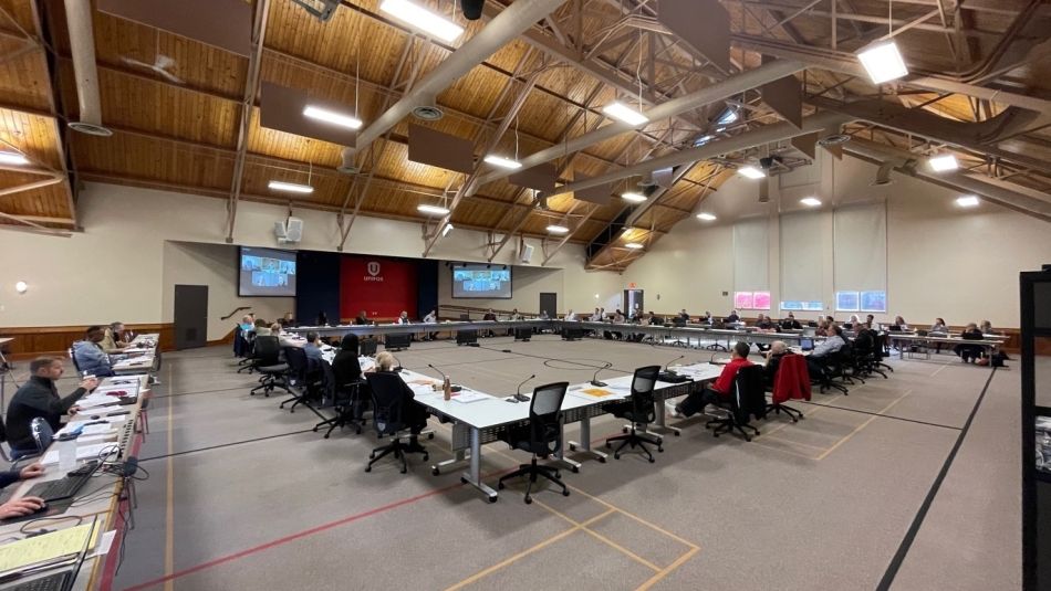 boardroom shot of the NEB meetings