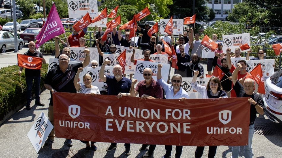 People holding a union for everyone banner