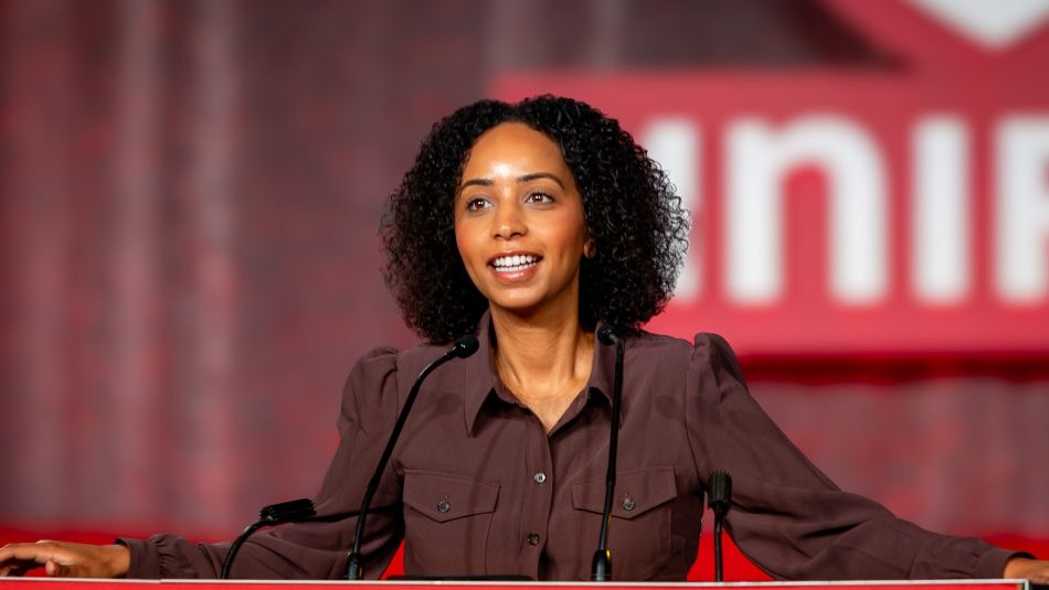 Samia Hashi speaking at a podium