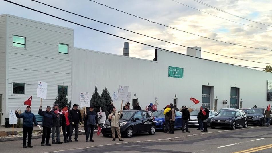 Unifor members at Prelco on the picket line.