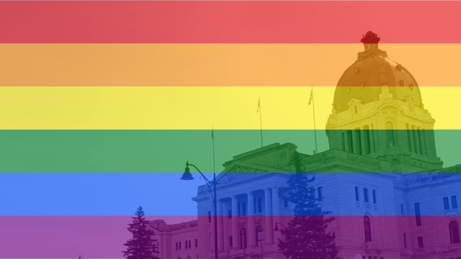 Saskatchewan legislature Pride flag superimposed over photo of the Saskatchewan legislature