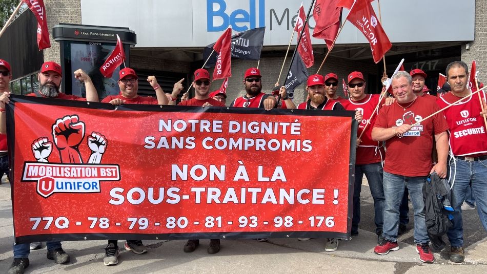 Unifor members rally outside Bell building in Montreal