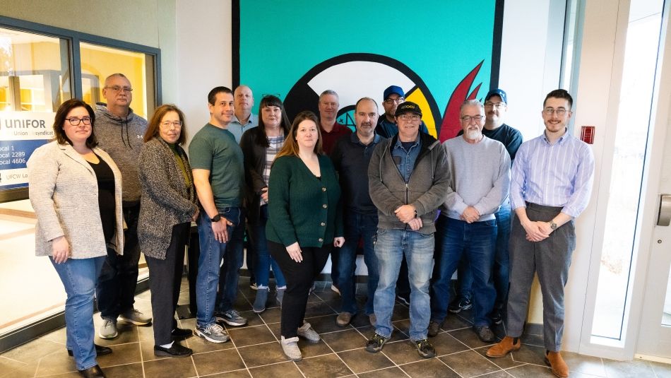 The Council of Support Unions bargaining committee stands in the foyer of the Unifor office in Halifax, NS.