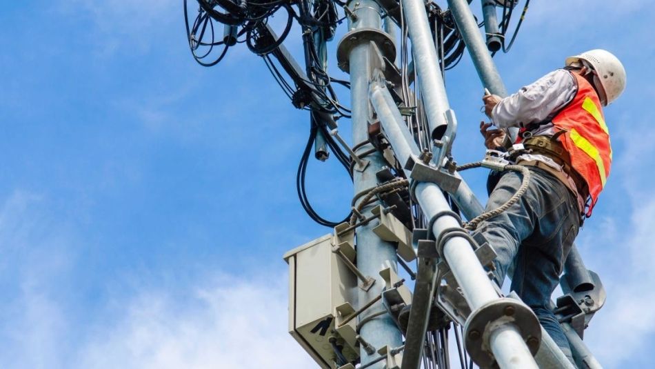 Telecomunications worker checks lines