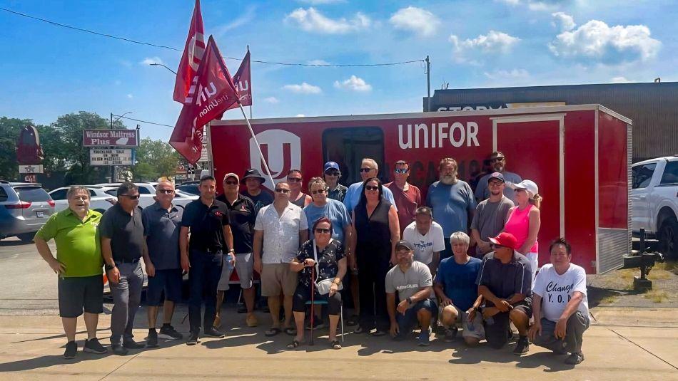 Unifor Local 195 members standing on the picket line at Titan Tool & Die