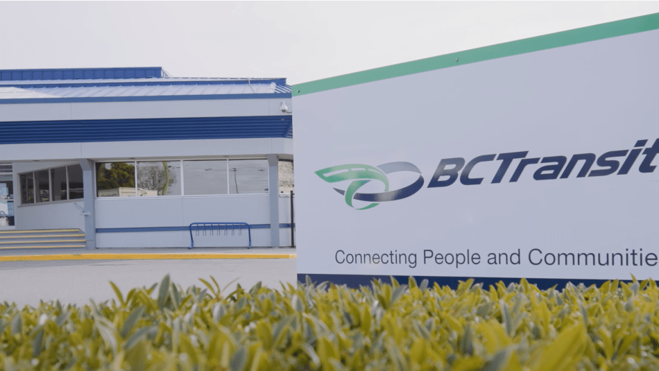 BC Transit sign on lawn of headquarters