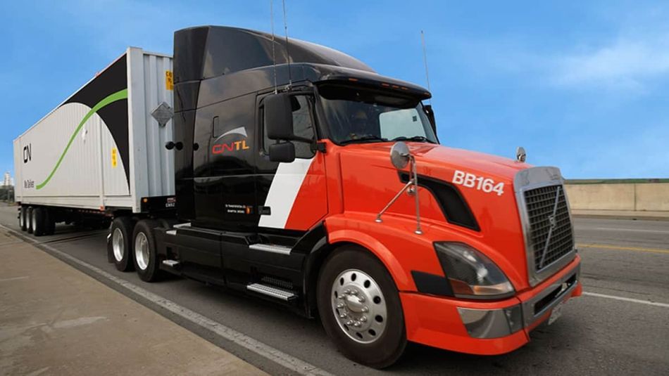 an orange and black semi truck