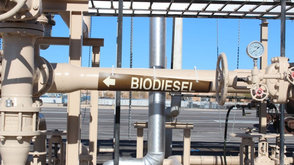 A series of pipes in an industrial setting, one of which is labelled "biofuel"
