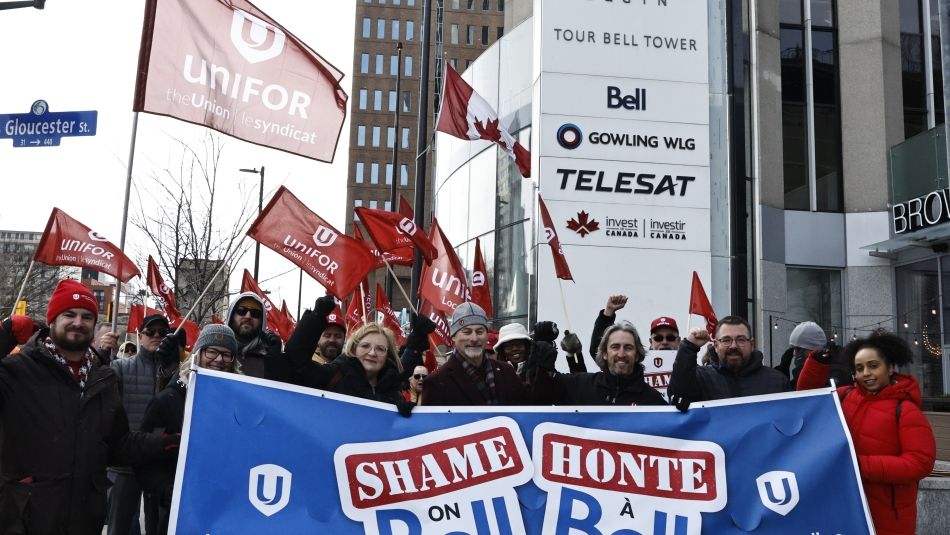 Unifor members rally in Ottawa earlier this year for the Shame on Bell campaign. 