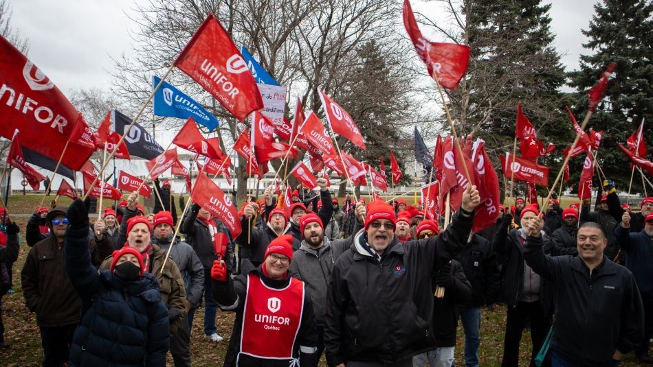 a group of people holding flags