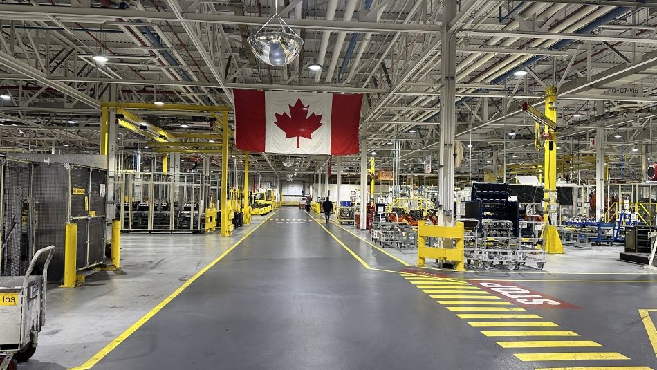 Auto engine plant with a Canadian flag hanging 
