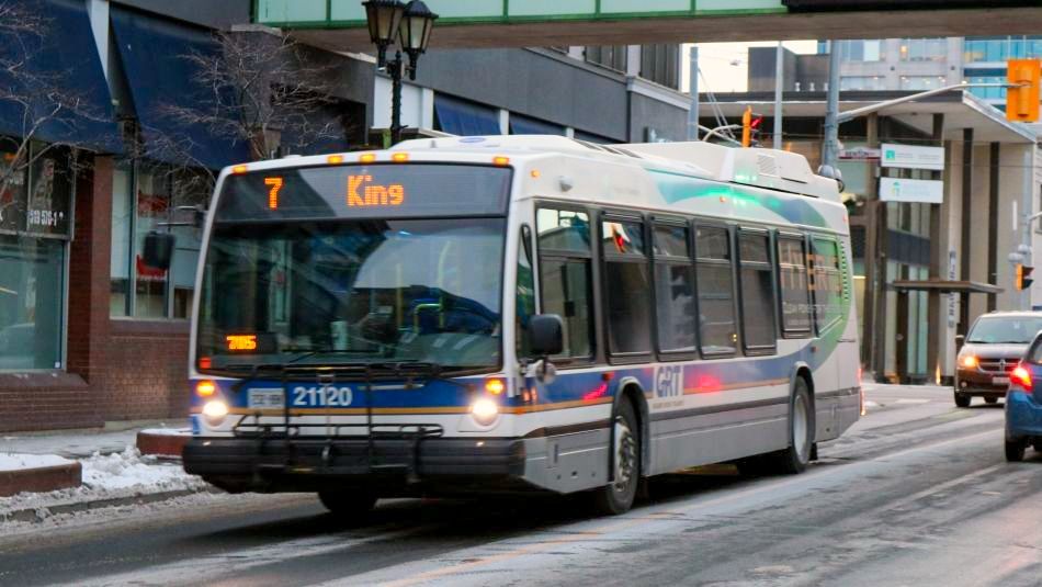 “Bus driving down the road.”