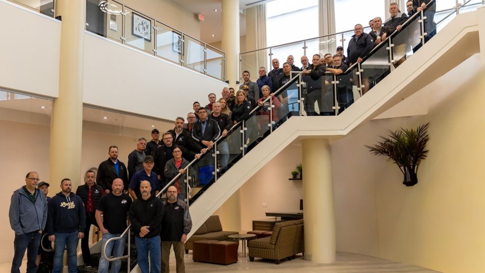 Unifor Stellantis Council group of people standing on a staircase