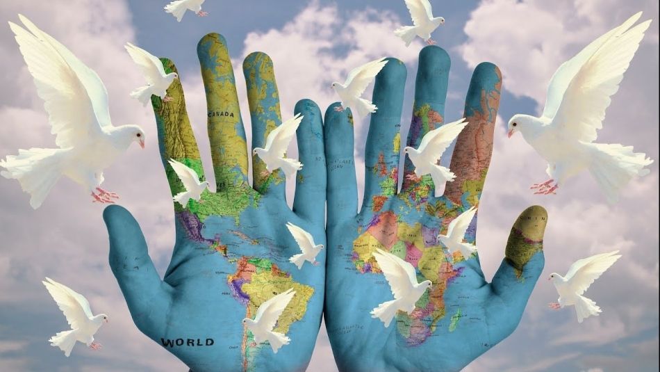 two hand with a word map open releasing doves