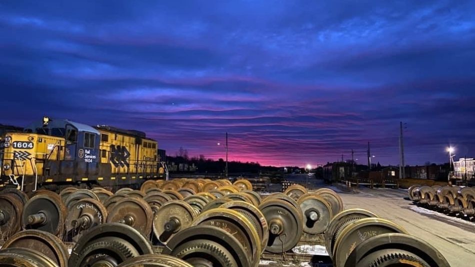 train field at dusk with a bright purple ski