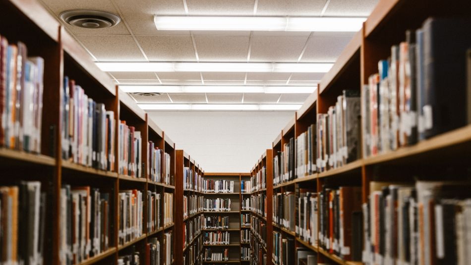 row of book shelves in a library