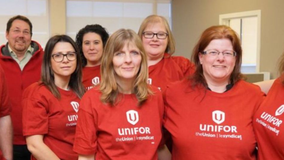 Uniformember wearing red Unifor t-shirts 