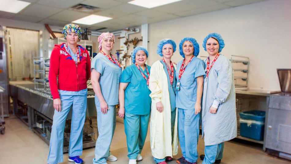 A group of nurses in scrubs.