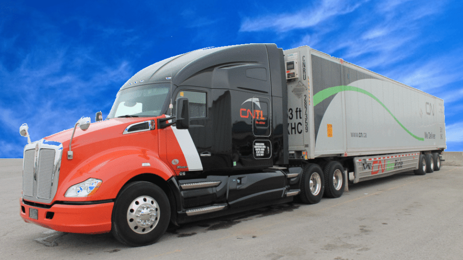 A CNTL transport truck parked outside on a clear day with a bright blue sky.