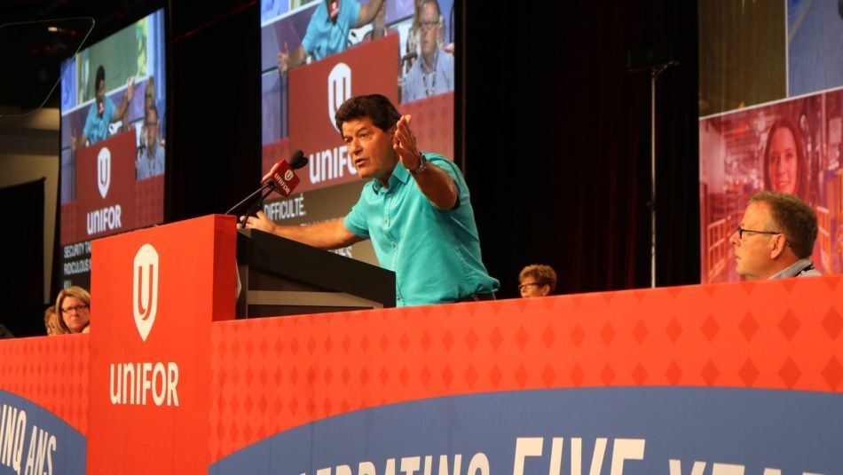 Jerry Dias speaks to delegates from the main stage at Canadian Council.