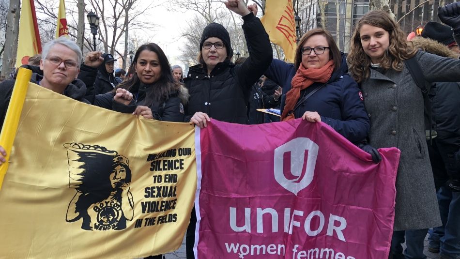 Lisa Kelly, Naureen Rizvi, Joie Warnock, Lana Payne and Roxanne Dubois participating in a rally.