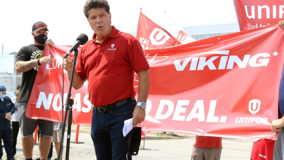 Unifor National President Jerry Dias speaks at a rally for striking De Havilland workers.