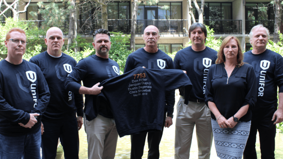 Unifor Paramedics John Sloan, Mike Chad, Wayde Diamond, Chuck Telky and Dan Lefebvre with Unifor National Representative Kelly-Anne Orr and Unifor Director of Health Corey Vemey remember the fallen as new TSB report finds system failed Ornge helicopter crew. 