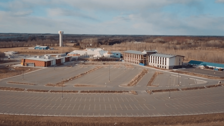 Arial view of a shut down casino and an empty parking lot