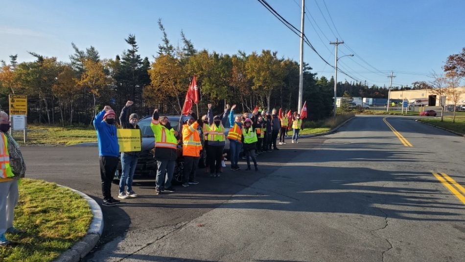 Striking members of Unifor Local 597 at a demonstration.