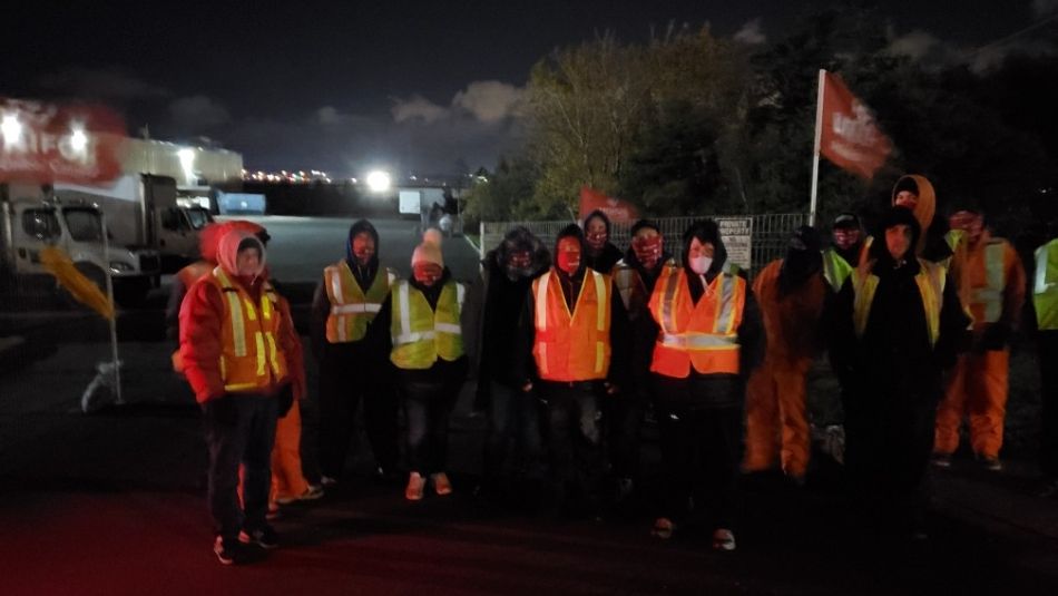 Striking members of Unifor Local 597 on a picket line.