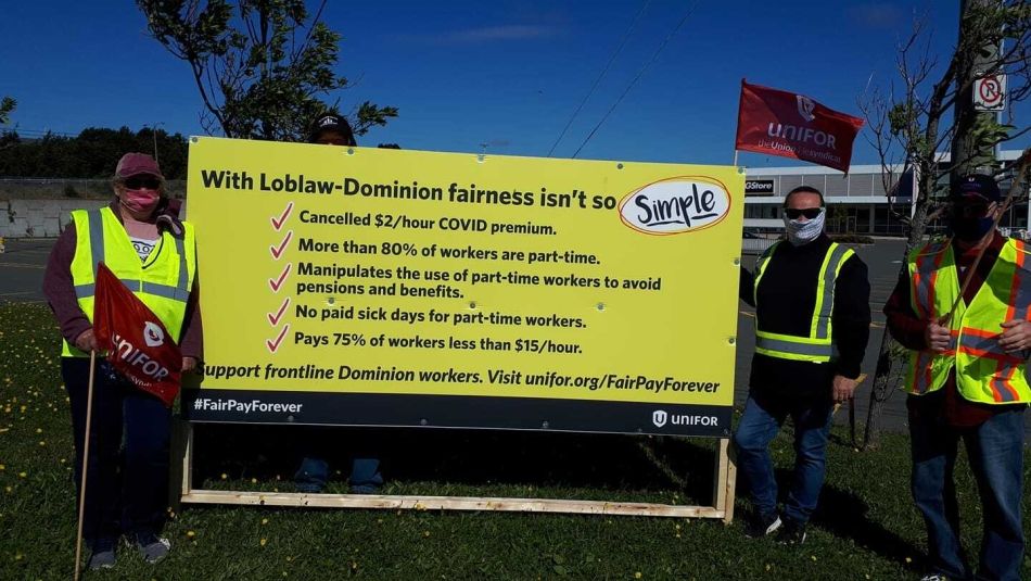 Members of Unifor Local 597 on a picket line.