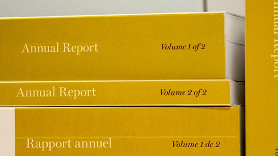 A photo of several copies of Ontario Auditor General annual reports.