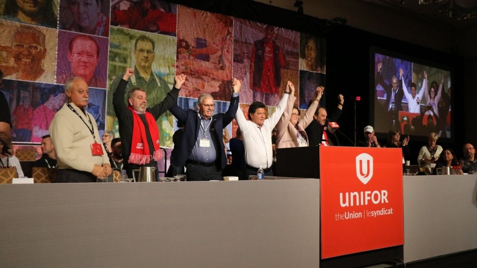 Jerry Dias, Harvey Bischof, Sam Hammond, Liz Stuart and Smokey Thomas on stage at Unifor Ontario Regional Council.