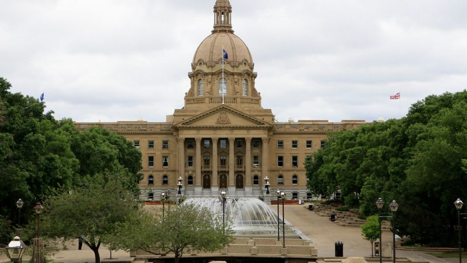 The Alberta legislature building sits in the distance.