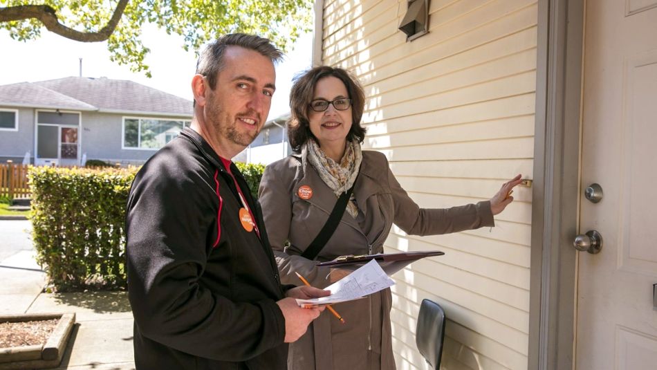 Gavin McGarrigle and Joie Warnock go door-to-door during the B.C. election campaign.