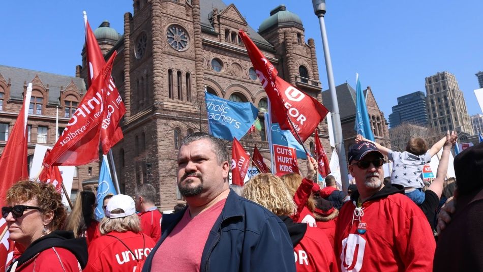 Unifor members rally at Queen's Park