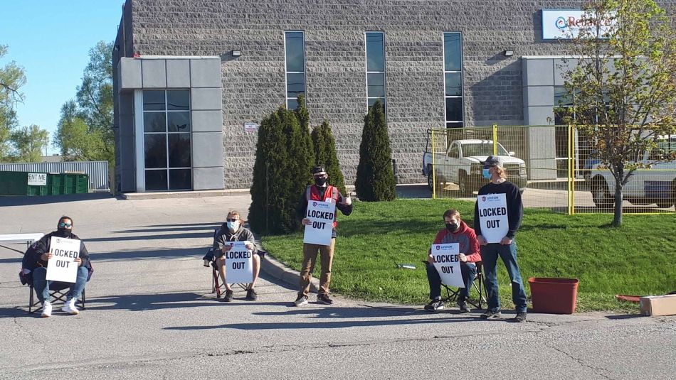 Locked out members on a picket line.