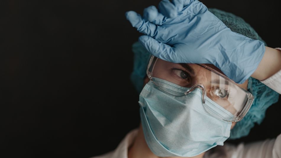 A health care worker in full PPE.