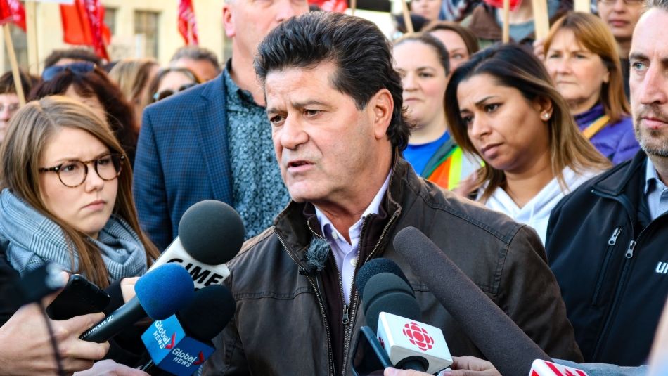 Jerry Dias speaks to a media scrum.