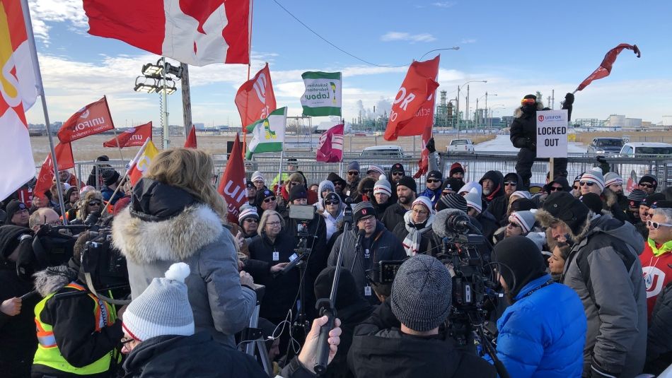 A media scrum on the Unifor picket line at Co-op Refinery.