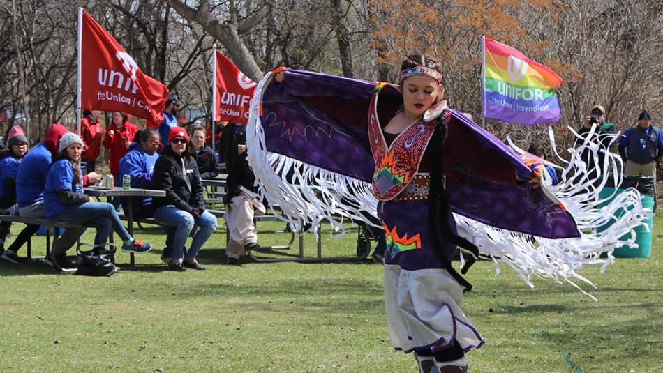 An indigenous dancer performs a traditional dance.