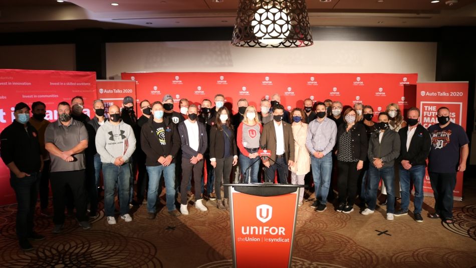 Jerry Dias and the Unifor Master Bargaining Committee at a press conference.