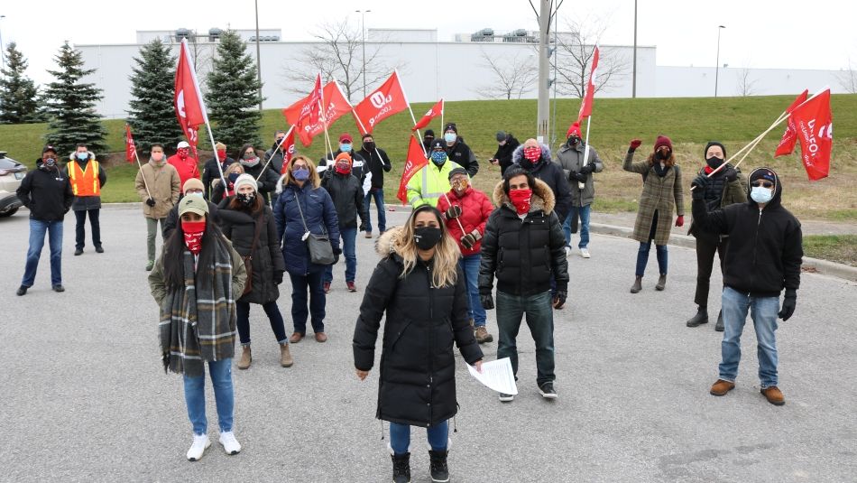 Naureen Rizvi with Unifor members in Ajax, Ontario.