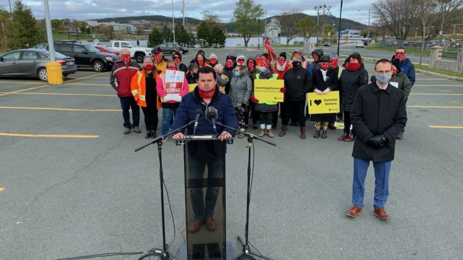 Chris MacDOnald and members of Unifor Local 597.