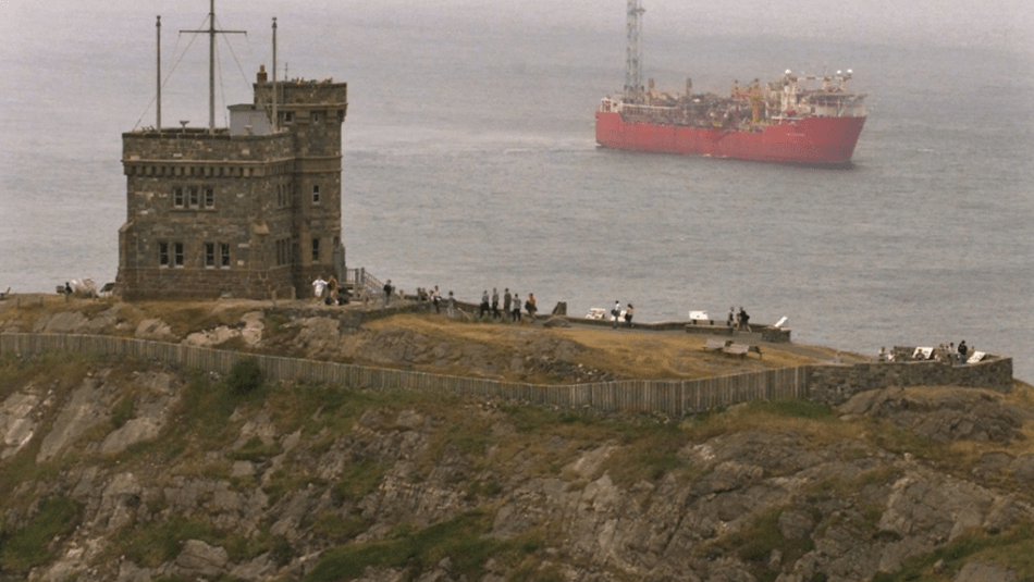 Photo of Terra Nova vessel from a distance with Signal Hill in the foreground